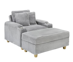 Grey corduroy single sofa with one pillow, two throw pillows, a footstool and two storage Spaces.