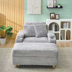Grey corduroy single sofa with one pillow, two throw pillows, a footstool and two storage Spaces.