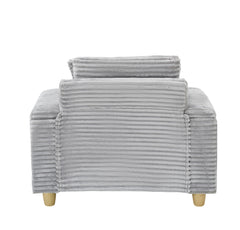 Grey corduroy single sofa with one pillow, two throw pillows, a footstool and two storage Spaces.