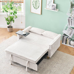 The pull-out and push-in beige corduroy sofa with dual functions, equipped with a movable tabletop and USB ports, is suitable for use in living rooms and bedrooms.