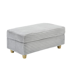 Grey corduroy single sofa with one pillow, two throw pillows, a footstool and two storage Spaces.