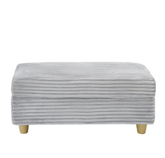 Grey corduroy single sofa with one pillow, two throw pillows, a footstool and two storage Spaces.